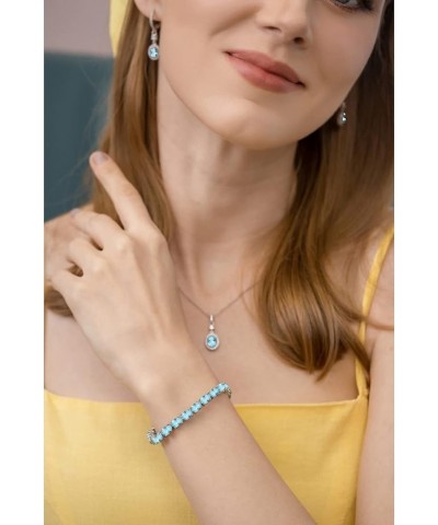 Sterling Silver 7x5mm Genuine, Simulated or Created Oval-cut Gemstone Tennis Bracelet for Women Simulated Paraiba $56.35 Brac...